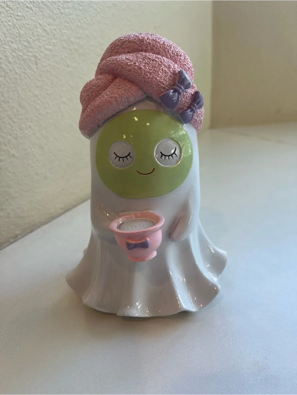 Halloween Spa Ghost Figurine with Pink Towel Face Mask and Tea Cup